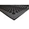 Black anti-slip mat, close-up. Rectangular with round openings and ribbed edges.