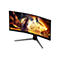 Gebogener AOC Gaming-Monitor auf einem Dreifußständer zeigt eine actionreiche orientalische Fantasy-Spielszene.