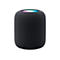 Schwarzer zylindrischer Smart Speaker mit netzartiger Oberfläche und leuchtender, farbiger Oberseite.