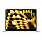 Beiges Notebook mit offenem Display, das ein gelb-schwarzes abstraktes Muster zeigt.