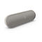 Beige Beats Pill Bluetooth-Lautsprecher in länglicher Kapselform vor weißem Hintergrund.
