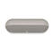 Beige, zylindrischer Bluetooth-Lautsprecher in Draufsicht mit Tasten für Lautstärke und Power sowie Beats-Logo.