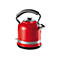 Roter Wasserkocher von Ariete mit schwarzem Griff und silbernem Metallstreifen vor weißem Hintergrund.
