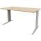 A beige desk with gray legs stands against a white background. The table top is rectangular.