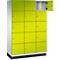 Armoire avec 15 portes jaunes; une porte ouverte, poignées métalliques. Socle noir, côtés blancs.