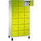 Une armoire avec de nombreuses portes jaune-vert, dont une est ouverte.