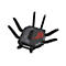 Ein schwarzer Gaming Router mit roten Details und zahlreichen Antennen, vor weißem Hintergrund.