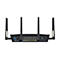 Schwarzer Router mit 6 Antennen und Anschlüssen wie LAN, USB. Vor weißem Hintergrund.