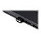 Ein kleiner schwarzer ASUS-USB-Stick eingesteckt in den seitlichen Port eines Laptops.