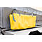Sac de transport industriel jaune suspendu à des supports métalliques gris, avec des sangles de transport grises.