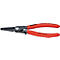 Pince avec poignées rouges et nom du produit. La pince a une pointe noire. Inscription : KNIPEX, 48 31 12, 19-60 mm.