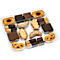 A clear plastic tray with a selection of biscuits: butter biscuits, chocolate wafer rolls, leaf-shaped pastry, chocolate squares and pretzels.