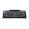 Schwarze, ergonomische und teilbare Goldtouch-Tastatur vor weißem Hintergrund.