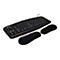 Schwarze, ergonomisch geteilte Goldtouch-Tastatur mit zwei separaten, gepolsterten Handballenauflagen vor weißem Hintergrund.