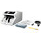 Gray-white money counting machine with accessories: cable, brush, cleaning cloth, and manual.