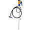 A yellow and blue barrel pump with a black hose and a blue handle. The device stands upright on a white base.