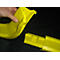 A man holds a yellow, U-shaped protective profile. The profile is broken in one place and not connected.