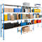 Shelving unit with various goods, including boxes, cartons, rolls, and other items.
