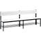 White bench with backrest and black frame. Horizontal bars are under the seat.