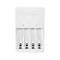 White Varta battery charger. Varta is written on top, below it are 4 slots for batteries.