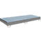 Metal tray, rectangular with grid surface, gray color, stands on metal feet.