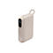 Batterie externe beige, affichant 100% de charge, avec logo "Belkin".