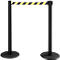 Two black bollards with a yellow and black striped barrier tape span a passage on a white background.