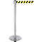 A silver stanchion with yellow and black striped tape. The post has a round base and a tape cassette.