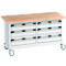 Werkbank mit Holzplatte, sechs Schubladen und Rollen.