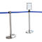 Two stainless steel stanchions with blue barrier tape and information sign. The background is white.