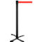 Black barrier post with red ribbon, in front of a white background.
