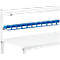 Blue assortment boxes with white labels hanging above a white desk. Above is a white shelf with lighting.