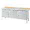 Metal workbench with drawers, wooden table top.