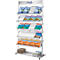 Silver brochure stand with travel brochures. Inscription: Info, Good travel trip.