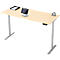 Bureau clair réglable en hauteur avec tablette, perforatrice et corbeille à papier.
