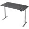 Bureau réglable en hauteur, dessus de table gris, panneau de commande sur le côté.