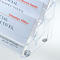 Close-up of a clear card holder with business cards. Names and contact information are visible on the cards.