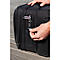 Close-up of a man opening a black luggage with a combination lock.