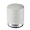 Objet cylindrique blanc avec anneau argenté à la base, posé sur une surface grise.