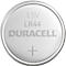 Duracell LR44 button cell, silver rim, grey surface with inscription: 1.5V LR44, DURACELL, plus sign.