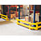 Yellow safety barrier in a warehouse. The yellow frame protects the area from entry. Goods are visible behind it on shelves.