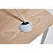 Close-up of a light wood desk. A white cable runs through a silver-gray cable grommet.