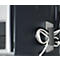 Close-up of a black PC case with cable holder. Black and white cables are neatly arranged. HP logo.