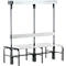 Gray metal frame with seat and two poles connected to a shelf.