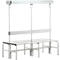 Grey metal bench with backrest and superstructure. It has a seat with wooden slats. The backrest is also made of metal.