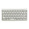 Ein weißes, kompaktes Keyboard mit schwarzen Buchstaben, Zahlen und Symbolen. Tastenbeschriftungen sind erkennbar.