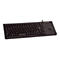 Schwarze Cherry-Tastatur mit integriertem Trackball und Funktionstasten. Das Layout ist deutsch.