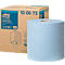Rouleau d'essuie-tout Tork Heavy-Duty bleu devant une boîte distributrice en carton.