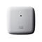 Ein weißes, quadratisches Gerät mit abgerundeten Ecken. Oben befindet sich ein kleiner, schwarzer Punkt, darunter das Cisco-Logo.