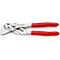 Pince Knipex avec poignées rouges. Des informations sont imprimées sur les poignées.